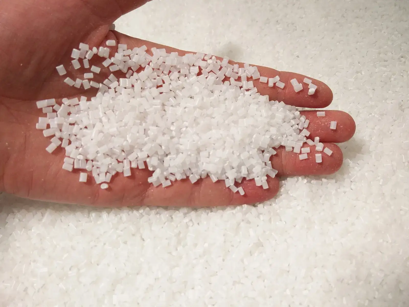 Handful of ABS plastic granules