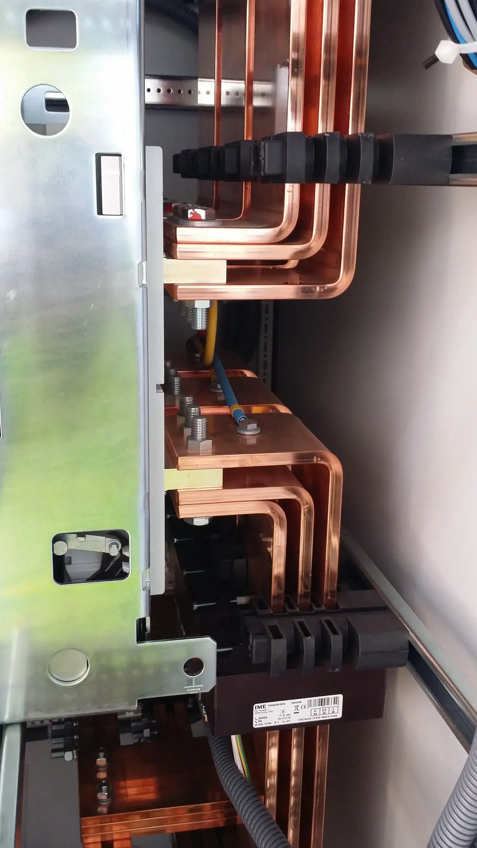 Heavy copper busbars in an electrical control panel