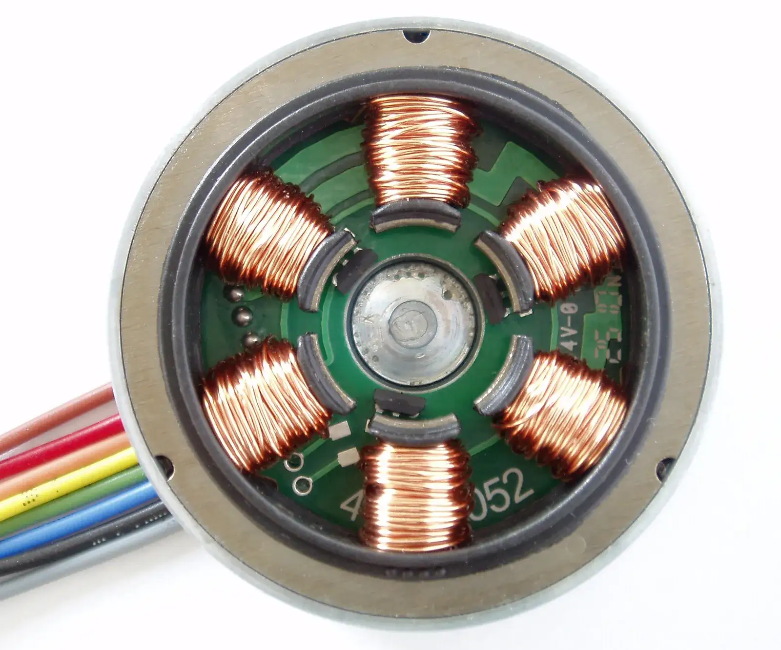 Copper coil windings on a small motor stator