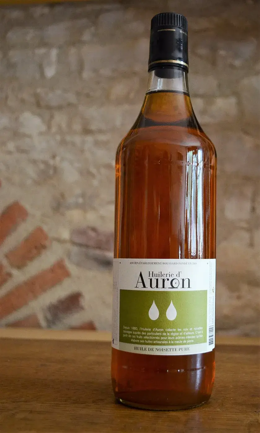A bottle of hazelnut oil with a paper label