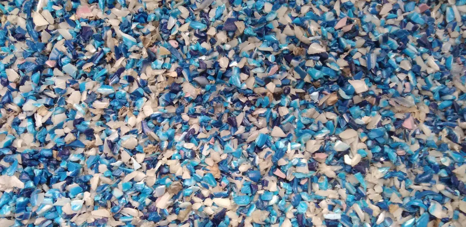 Clean blue HDPE drum regrind flakes