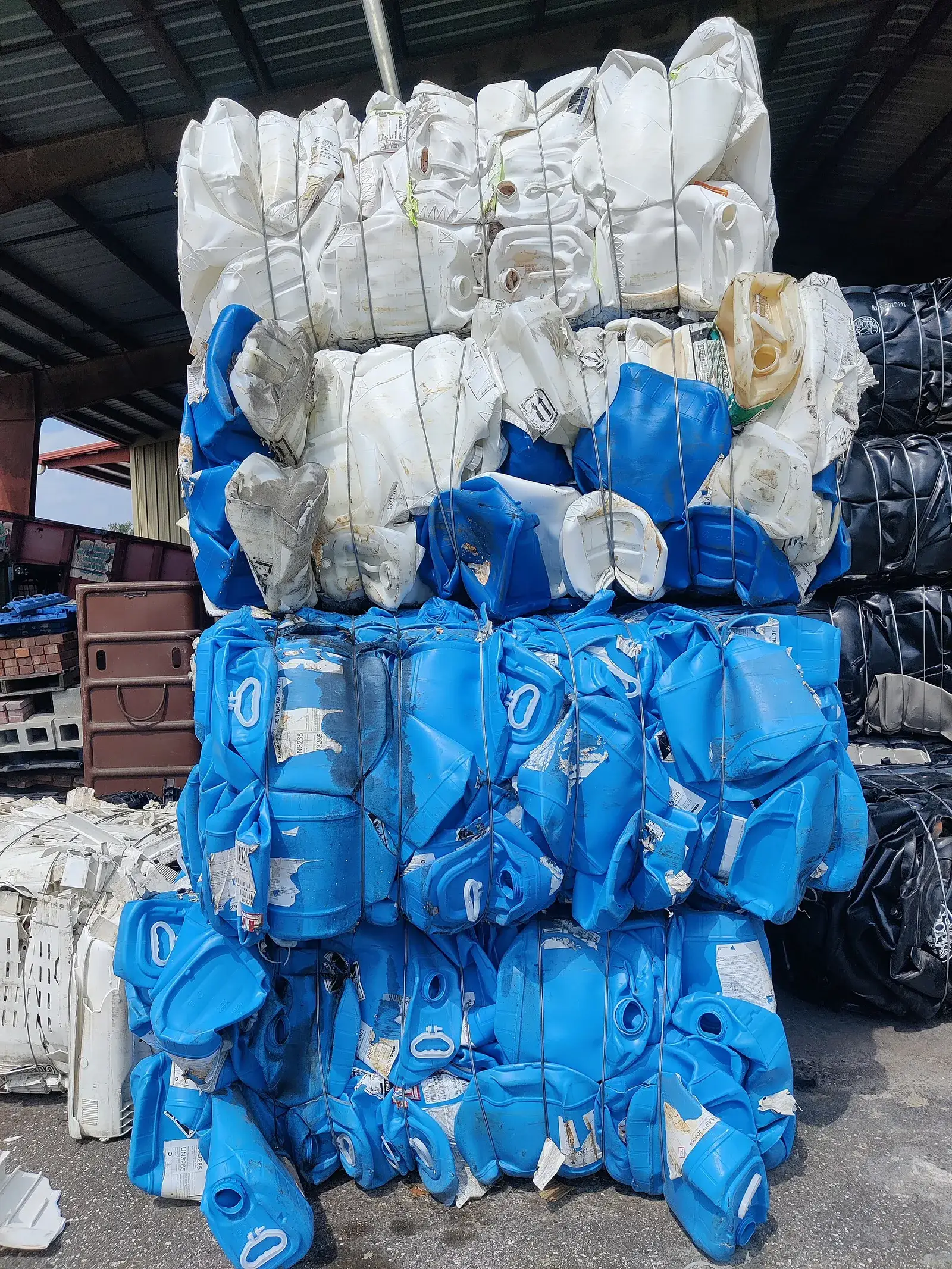 Stacked bales of HDPE jerry cans