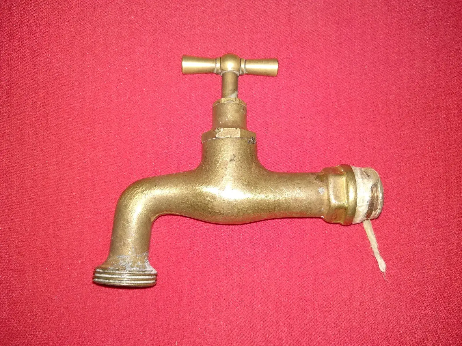 Old yellow brass tap