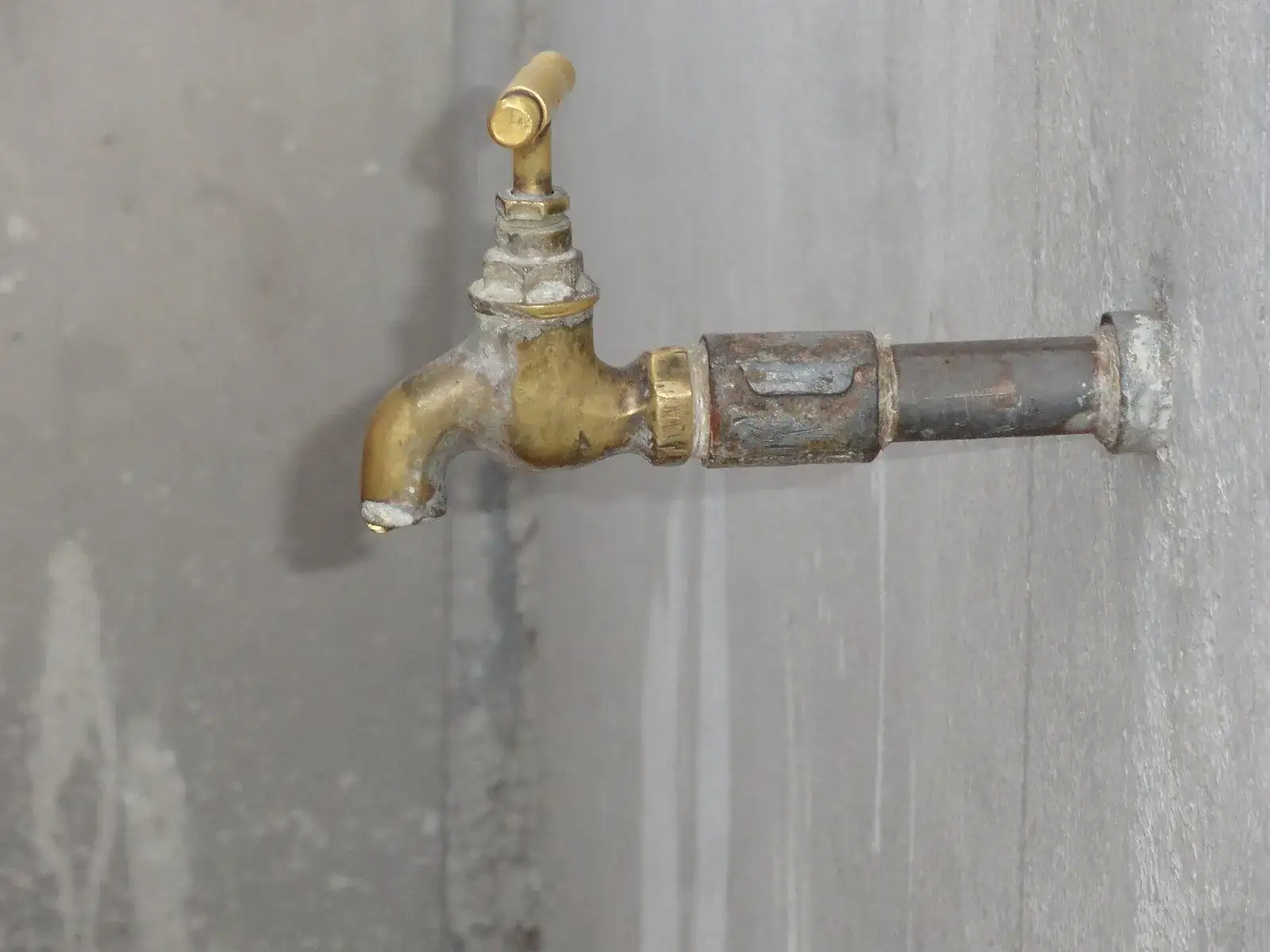 Brass tap on a wall