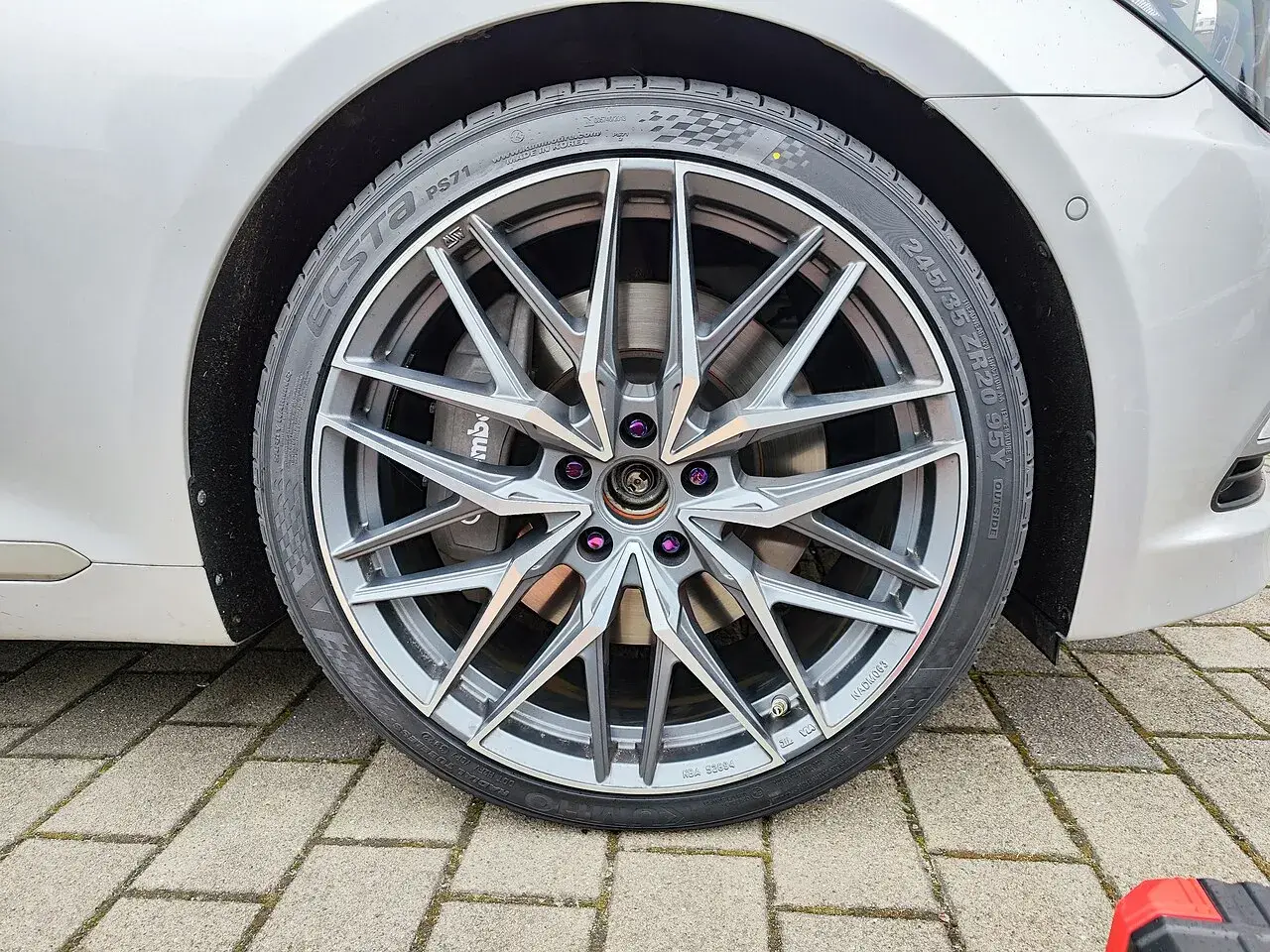 Kumho Ecsta PS71 tyre, size 245/35 ZR20 95Y, fitted to an alloy wheel — model name and size legible on the sidewall
