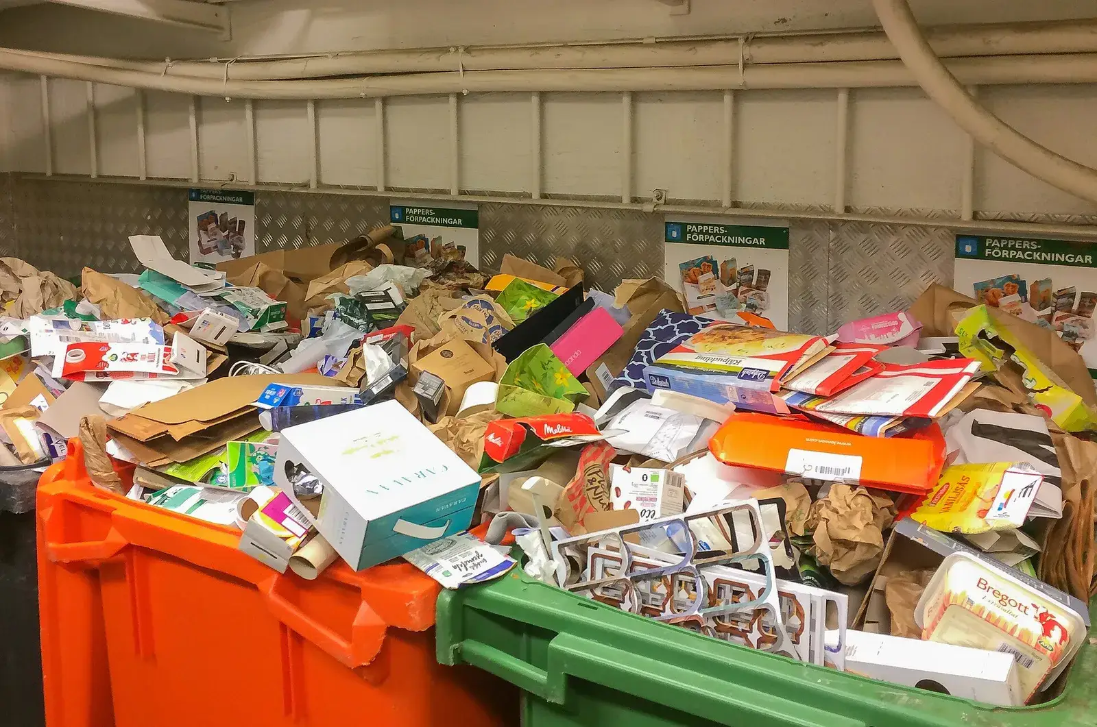 Recycling containers filled with magazines and mixed paper