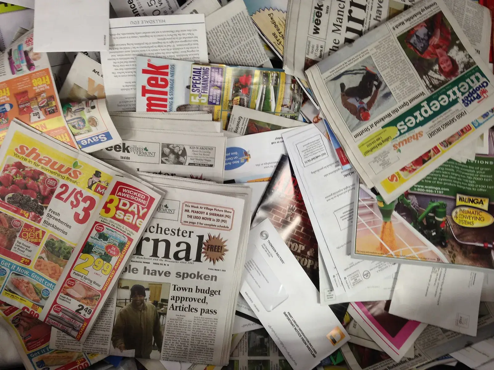 Pile of old newspapers collected for recycling