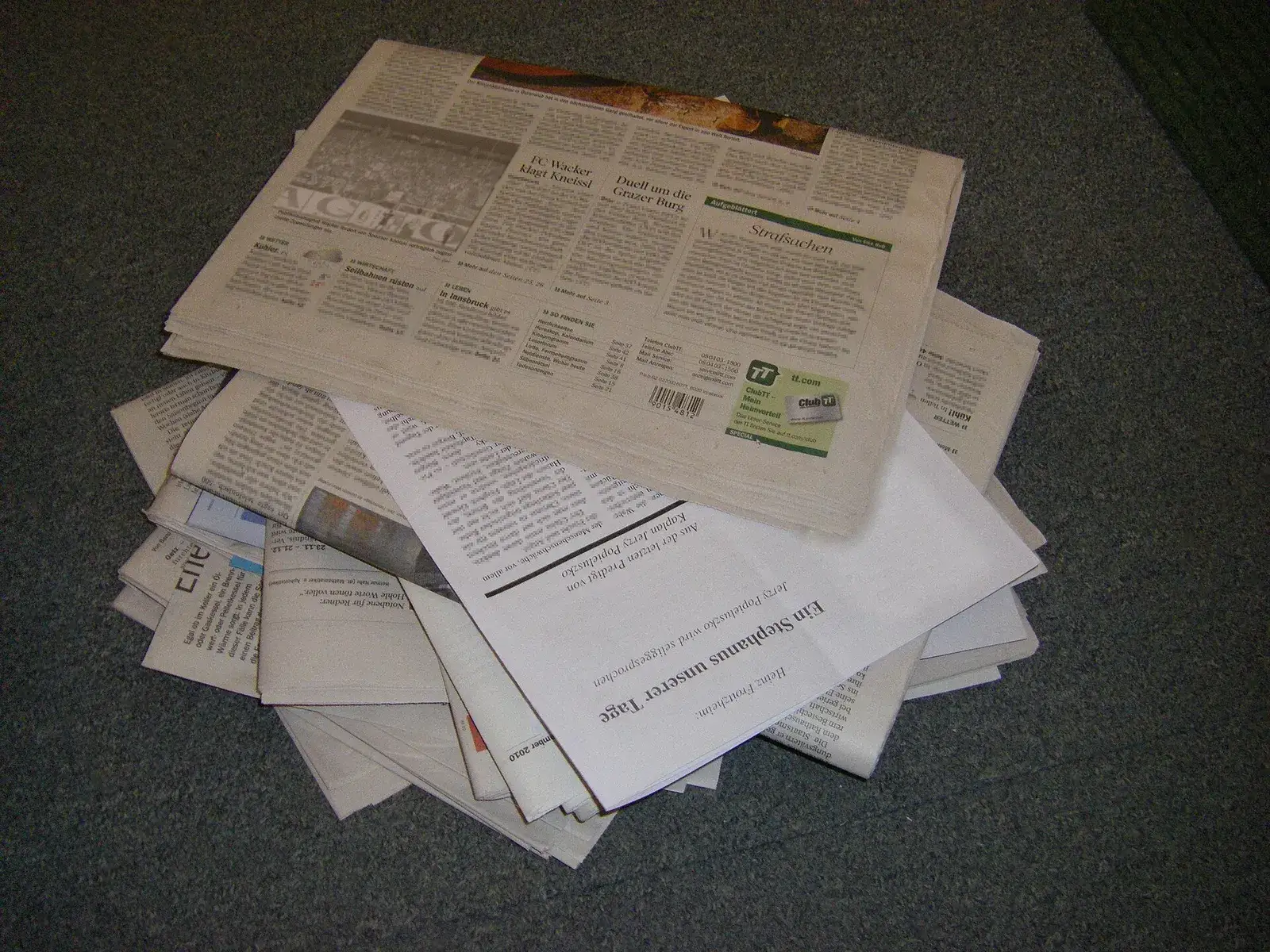 Stack of old newspapers for recycling