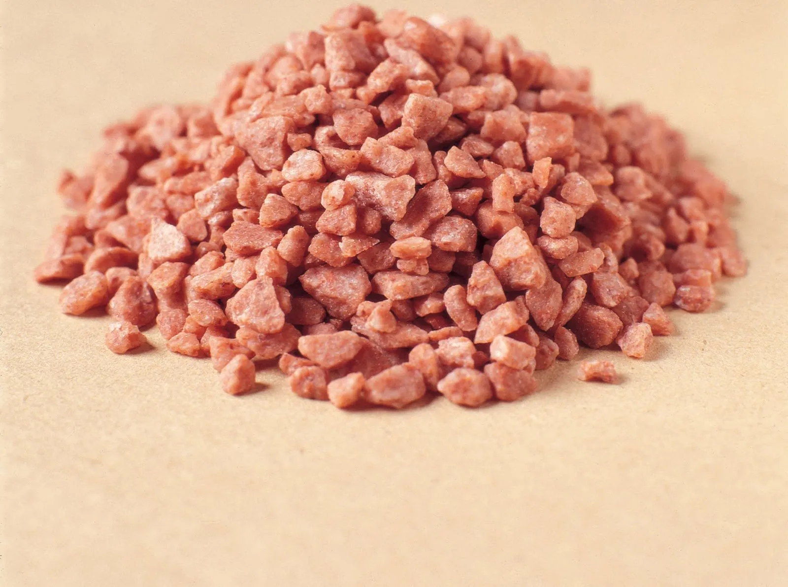 Pile of pink potassium chloride (potash) granules