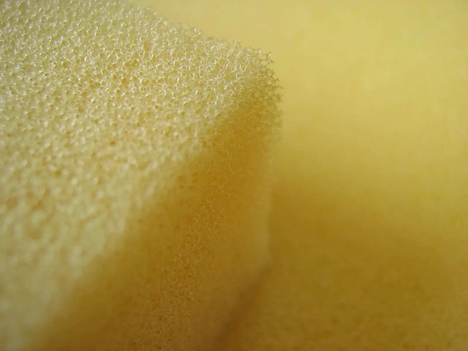 Close-up of yellow flexible polyurethane foam