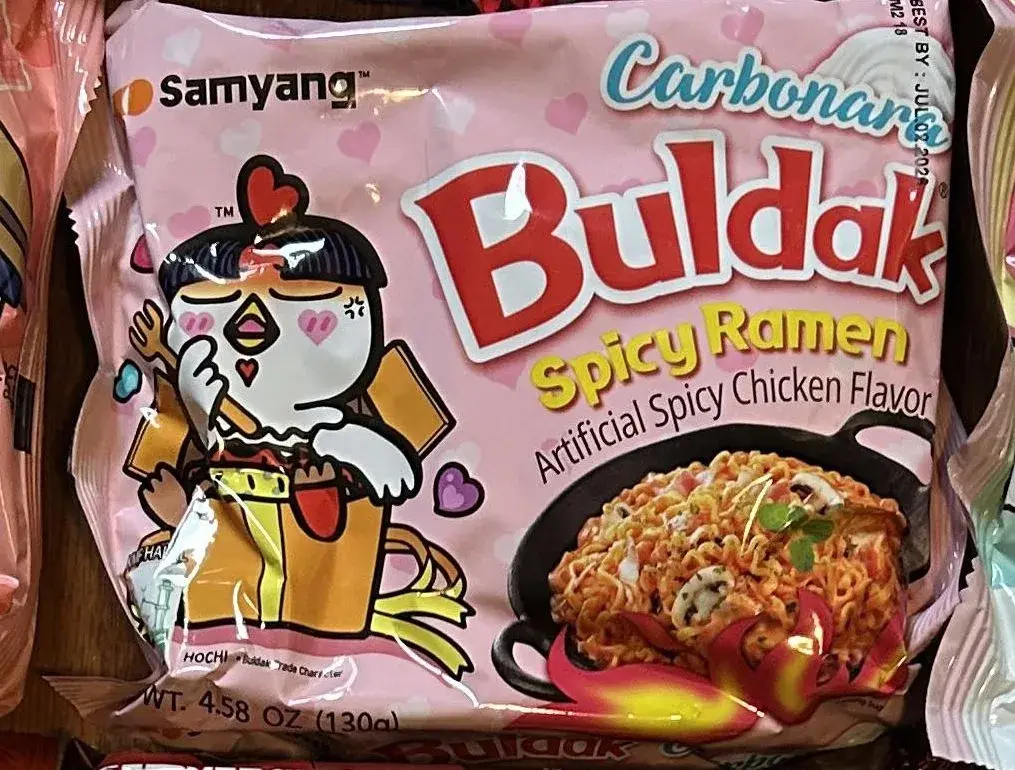 Front of a Samyang Buldak Carbonara Spicy Ramen pack, net weight 4.58 oz (130 g)