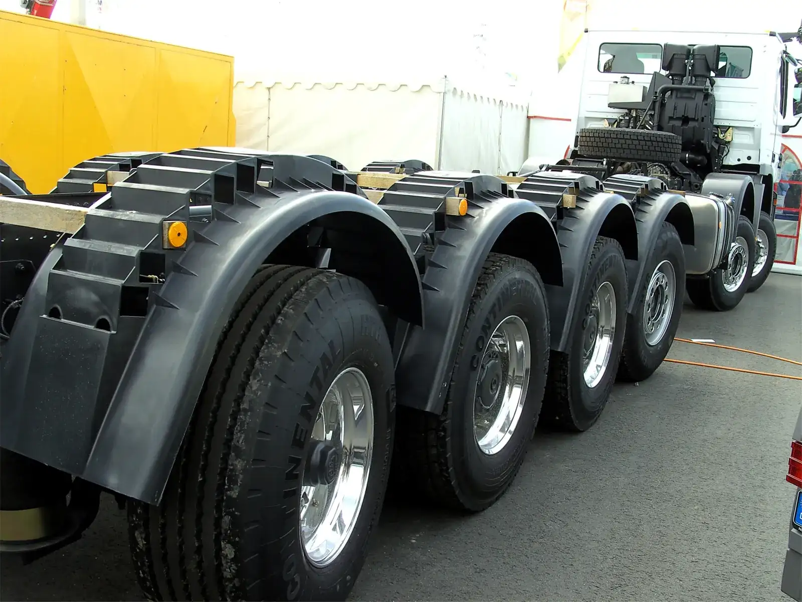 Truck tyres on the multiple axles of a heavy lorry