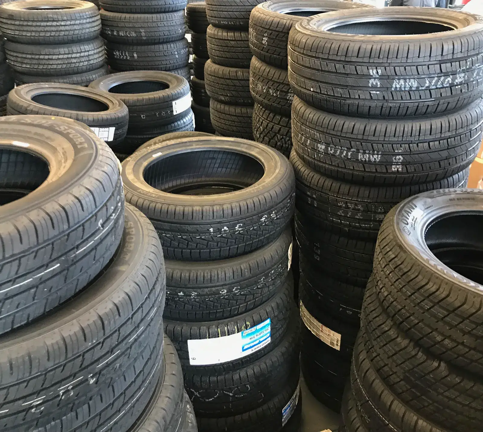 Car tyres stacked in a yard