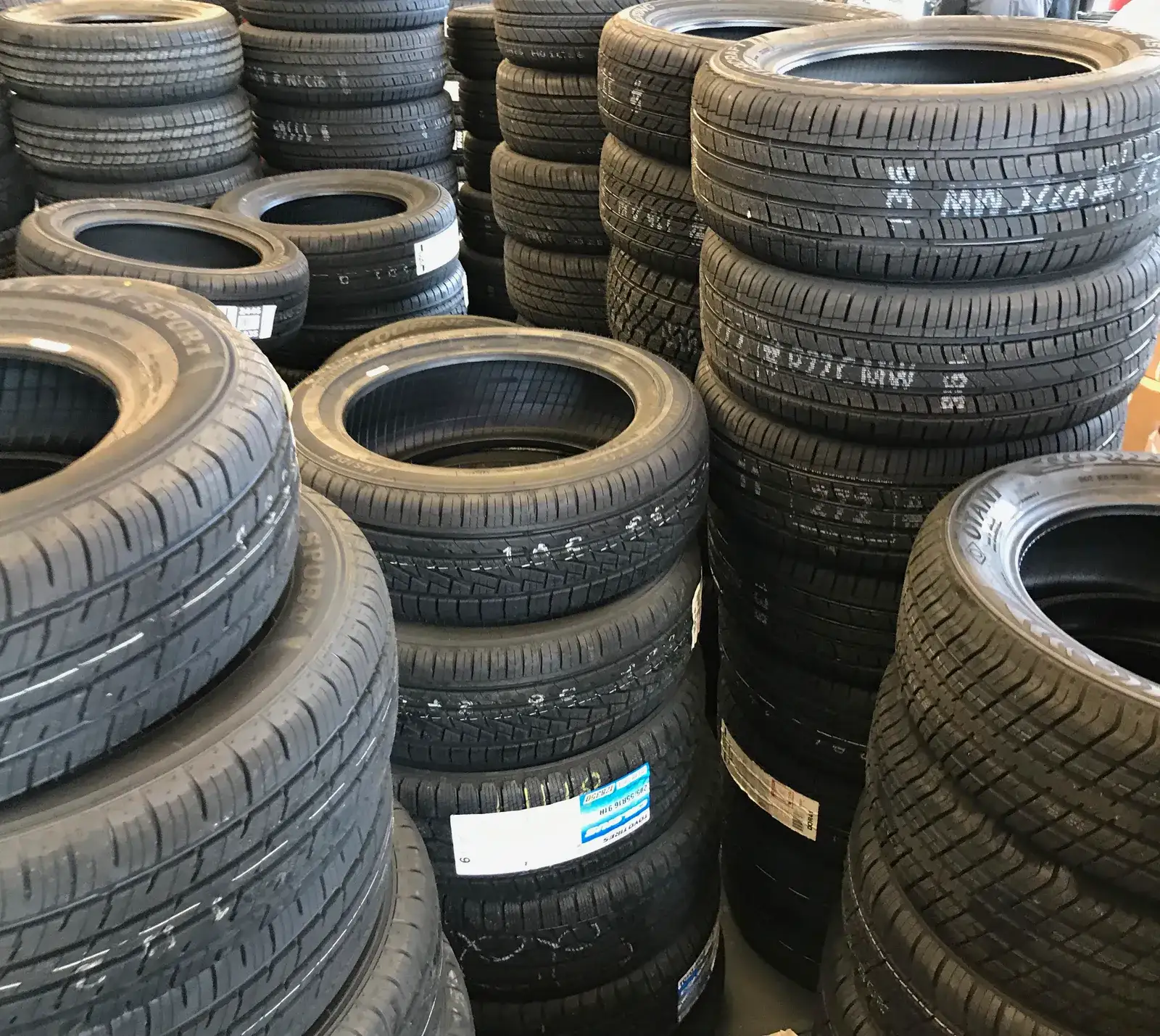 Car tyres stacked in a yard