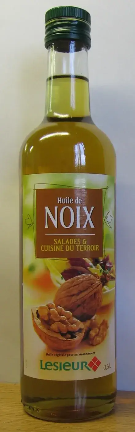 A retail bottle of walnut oil with a label reading “noix”